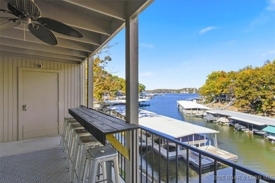This beautifully updated 2-bedroom, 2-bath lakefront condo on Tan-Tar-A Golf Club in Missouri - for sale on GolfHomes.com, golf home, golf lot