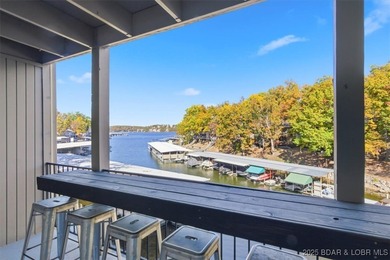 This beautifully updated 2-bedroom, 2-bath lakefront condo on Tan-Tar-A Golf Club in Missouri - for sale on GolfHomes.com, golf home, golf lot