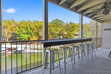This beautifully updated 2-bedroom, 2-bath lakefront condo on Tan-Tar-A Golf Club in Missouri - for sale on GolfHomes.com, golf home, golf lot