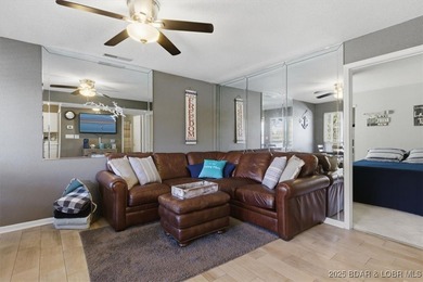 This beautifully updated 2-bedroom, 2-bath lakefront condo on Tan-Tar-A Golf Club in Missouri - for sale on GolfHomes.com, golf home, golf lot