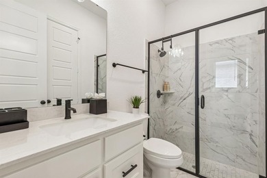 This stunning home features high end finishes, built by Britton on The Tribute At the Colony in Texas - for sale on GolfHomes.com, golf home, golf lot