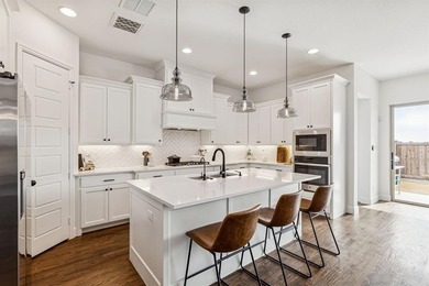 This stunning home features high end finishes, built by Britton on The Tribute At the Colony in Texas - for sale on GolfHomes.com, golf home, golf lot