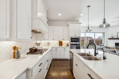 This stunning home features high end finishes, built by Britton on The Tribute At the Colony in Texas - for sale on GolfHomes.com, golf home, golf lot