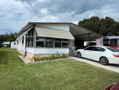 This 2-bedroom, 2-bath home has been remodeled in the last year on Grasslands Golf and Country Club in Florida - for sale on GolfHomes.com, golf home, golf lot