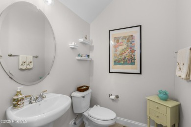 Tucked into the sought after gated golf community of Porters on Porters Neck Country Club in North Carolina - for sale on GolfHomes.com, golf home, golf lot