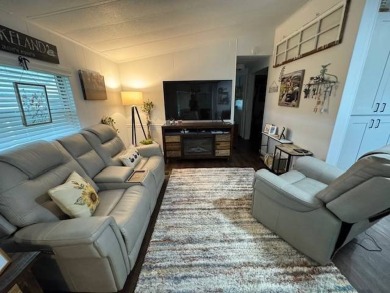 This 2-bedroom, 2-bath home has been remodeled in the last year on Grasslands Golf and Country Club in Florida - for sale on GolfHomes.com, golf home, golf lot