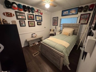 This 2-bedroom, 2-bath home has been remodeled in the last year on Grasslands Golf and Country Club in Florida - for sale on GolfHomes.com, golf home, golf lot