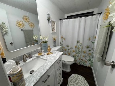 This 2-bedroom, 2-bath home has been remodeled in the last year on Grasslands Golf and Country Club in Florida - for sale on GolfHomes.com, golf home, golf lot