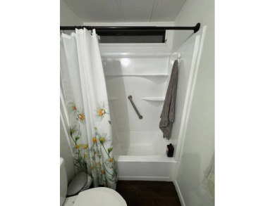 This 2-bedroom, 2-bath home has been remodeled in the last year on Grasslands Golf and Country Club in Florida - for sale on GolfHomes.com, golf home, golf lot
