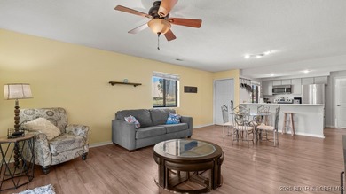 Welcome home to the Osage Vista's community. This top floor unit on Seasons Ridge At Four Seasons in Missouri - for sale on GolfHomes.com, golf home, golf lot