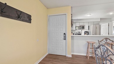 Welcome home to the Osage Vista's community. This top floor unit on Seasons Ridge At Four Seasons in Missouri - for sale on GolfHomes.com, golf home, golf lot