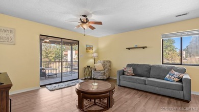 Welcome home to the Osage Vista's community. This top floor unit on Seasons Ridge At Four Seasons in Missouri - for sale on GolfHomes.com, golf home, golf lot