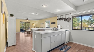 Welcome home to the Osage Vista's community. This top floor unit on Seasons Ridge At Four Seasons in Missouri - for sale on GolfHomes.com, golf home, golf lot