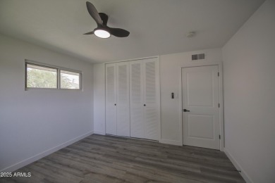 Beautifully remodeled home tucked away on a cul de sac lot in a on Encanto 18 Golf Course in Arizona - for sale on GolfHomes.com, golf home, golf lot