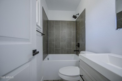 Beautifully remodeled home tucked away on a cul de sac lot in a on Encanto 18 Golf Course in Arizona - for sale on GolfHomes.com, golf home, golf lot
