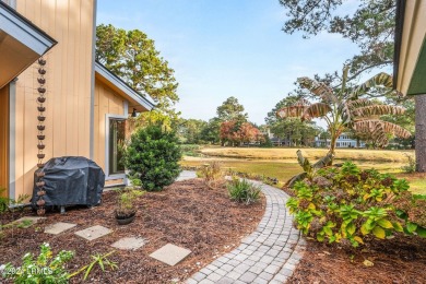 Keeping it simple in this charming one-level home overlooking a on Dataw Island Club in South Carolina - for sale on GolfHomes.com, golf home, golf lot