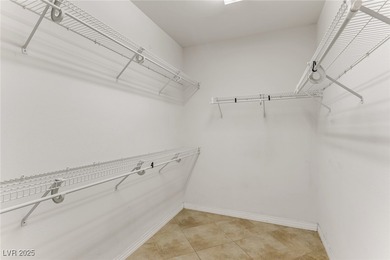 Elegant Anthem retreat with sweeping Strip, mountain & city on Revere Golf Club in Nevada - for sale on GolfHomes.com, golf home, golf lot