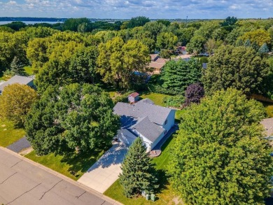 Great curb appeal is only the beginning! The concrete drive, 3 on Wild Marsh Golf Club in Minnesota - for sale on GolfHomes.com, golf home, golf lot