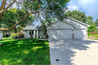 Great curb appeal is only the beginning! The concrete drive, 3 on Wild Marsh Golf Club in Minnesota - for sale on GolfHomes.com, golf home, golf lot