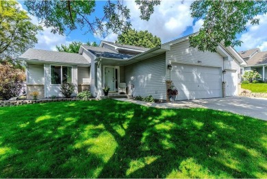 Great curb appeal is only the beginning! The concrete drive, 3 on Wild Marsh Golf Club in Minnesota - for sale on GolfHomes.com, golf home, golf lot