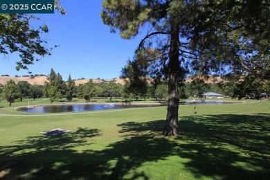 Wake up to sweeping views of the 14th fairway and the rolling on Rossmoor Golf Course in California - for sale on GolfHomes.com, golf home, golf lot