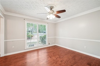 Welcome to this beautiful brick front home nestled on a sweeping on Hidden Hills Country Club in Georgia - for sale on GolfHomes.com, golf home, golf lot
