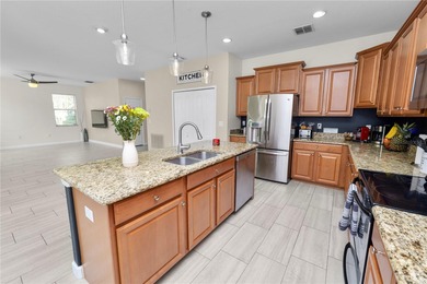 Welcome to resort-style living in this stunning golf course on Heritage Isles Golf and Country Club in Florida - for sale on GolfHomes.com, golf home, golf lot