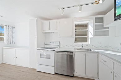 ALL AGES! CORNER UNIT ON THE FIRST FLOOR WITH SIDE WINDOWS & on Colony West Country Club in Florida - for sale on GolfHomes.com, golf home, golf lot