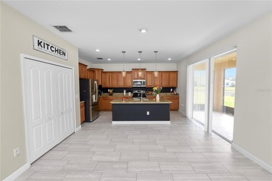 Welcome to resort-style living in this stunning golf course on Heritage Isles Golf and Country Club in Florida - for sale on GolfHomes.com, golf home, golf lot