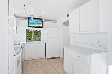 ALL AGES! CORNER UNIT ON THE FIRST FLOOR WITH SIDE WINDOWS & on Colony West Country Club in Florida - for sale on GolfHomes.com, golf home, golf lot