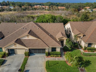 IN TIMBER GREENS A 55+ GATED GOLF COMMUNITY... This 2-bedroom 2 on Timber Greens Country Club in Florida - for sale on GolfHomes.com, golf home, golf lot