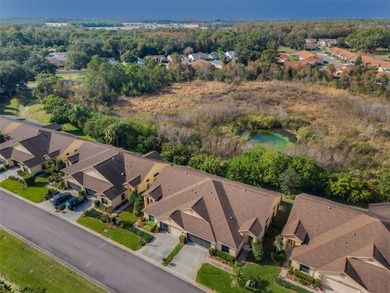 IN TIMBER GREENS A 55+ GATED GOLF COMMUNITY... This 2-bedroom 2 on Timber Greens Country Club in Florida - for sale on GolfHomes.com, golf home, golf lot