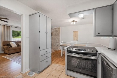 Welcome to this stunning tri-level home featuring four spacious on Vache-Grasse Country Club in Arkansas - for sale on GolfHomes.com, golf home, golf lot
