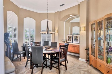 From the moment you step inside, this home captures the essence on University Park Country Club in Florida - for sale on GolfHomes.com, golf home, golf lot