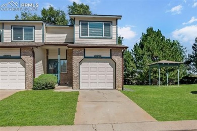 Experience the charm of this delightful end-unit townhome in the on Valley Hi Golf Course in Colorado - for sale on GolfHomes.com, golf home, golf lot