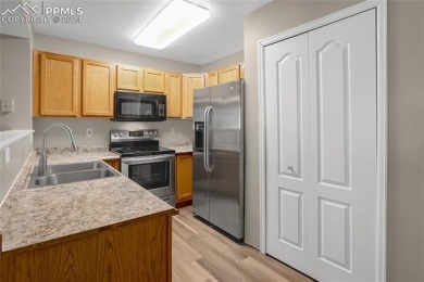 Experience the charm of this delightful end-unit townhome in the on Valley Hi Golf Course in Colorado - for sale on GolfHomes.com, golf home, golf lot