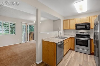 Experience the charm of this delightful end-unit townhome in the on Valley Hi Golf Course in Colorado - for sale on GolfHomes.com, golf home, golf lot