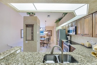 Stunning 3BR/2BA 2nd-floor End unit in the member owned Bundled on Worthington Country Club in Florida - for sale on GolfHomes.com, golf home, golf lot