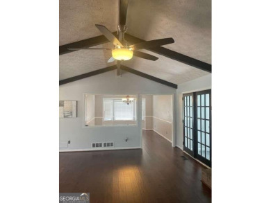 This ranch home is happily situated on a beautiful 1.03-acre lot on Honey Creek Country Club in Georgia - for sale on GolfHomes.com, golf home, golf lot