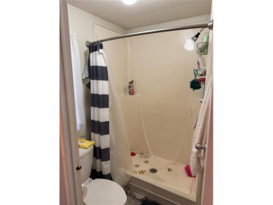 Fixer Upper! Needs TLC! This 960-square-foot doublewide home in on Twin Isles Country Club in Florida - for sale on GolfHomes.com, golf home, golf lot