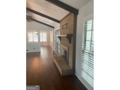 This ranch home is happily situated on a beautiful 1.03-acre lot on Honey Creek Country Club in Georgia - for sale on GolfHomes.com, golf home, golf lot
