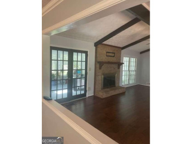 This ranch home is happily situated on a beautiful 1.03-acre lot on Honey Creek Country Club in Georgia - for sale on GolfHomes.com, golf home, golf lot