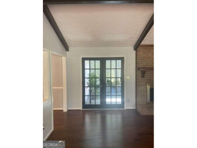 This ranch home is happily situated on a beautiful 1.03-acre lot on Honey Creek Country Club in Georgia - for sale on GolfHomes.com, golf home, golf lot