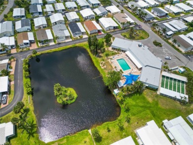 Fixer Upper! Needs TLC! This 960-square-foot doublewide home in on Twin Isles Country Club in Florida - for sale on GolfHomes.com, golf home, golf lot