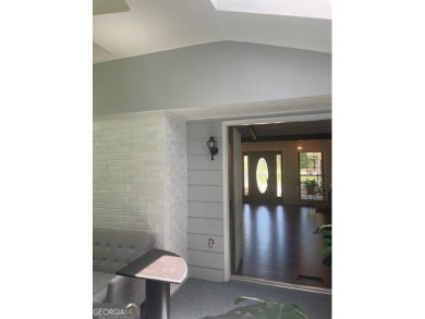 This ranch home is happily situated on a beautiful 1.03-acre lot on Honey Creek Country Club in Georgia - for sale on GolfHomes.com, golf home, golf lot