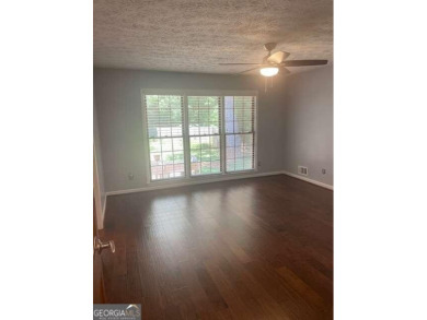 This ranch home is happily situated on a beautiful 1.03-acre lot on Honey Creek Country Club in Georgia - for sale on GolfHomes.com, golf home, golf lot