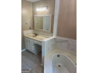 This ranch home is happily situated on a beautiful 1.03-acre lot on Honey Creek Country Club in Georgia - for sale on GolfHomes.com, golf home, golf lot