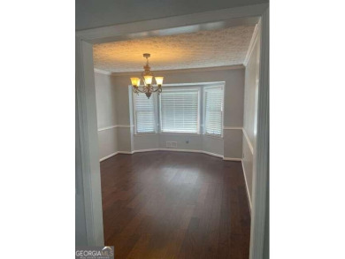 This ranch home is happily situated on a beautiful 1.03-acre lot on Honey Creek Country Club in Georgia - for sale on GolfHomes.com, golf home, golf lot