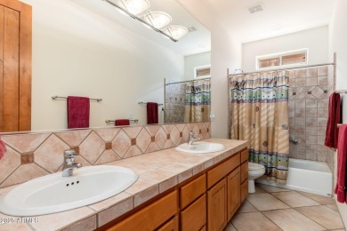 Experience desert living in this stunning 4-bedroom home located on Troon North Golf Club  in Arizona - for sale on GolfHomes.com, golf home, golf lot