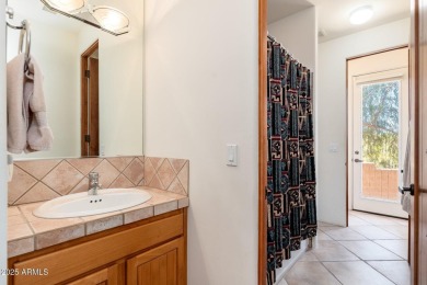 Experience desert living in this stunning 4-bedroom home located on Troon North Golf Club  in Arizona - for sale on GolfHomes.com, golf home, golf lot